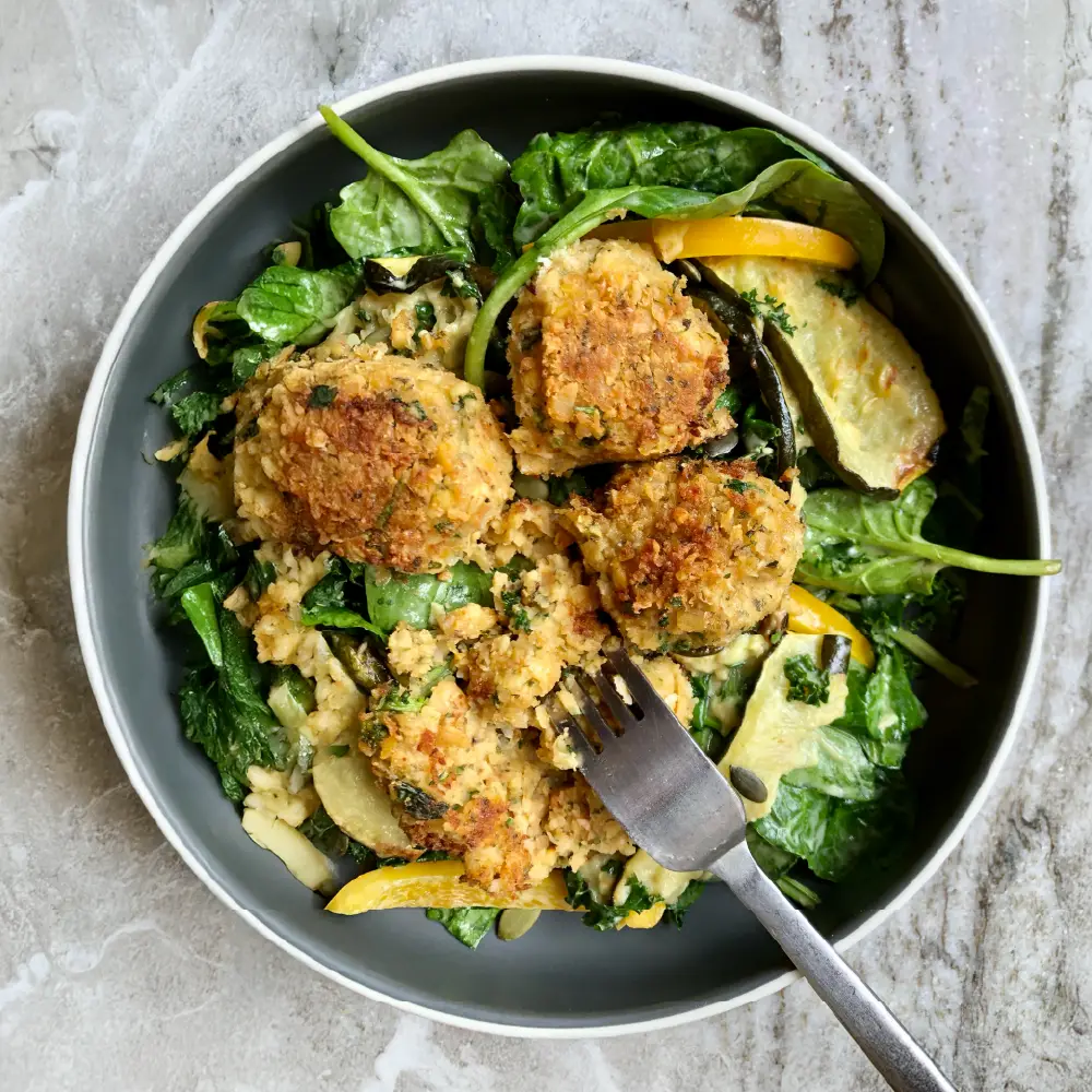 Recipe Panko-Coated Chickpea Falafels with Leafy Greens and Roasted Vegetables